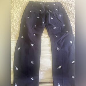 LOFT navy blue pants with little white roses on them